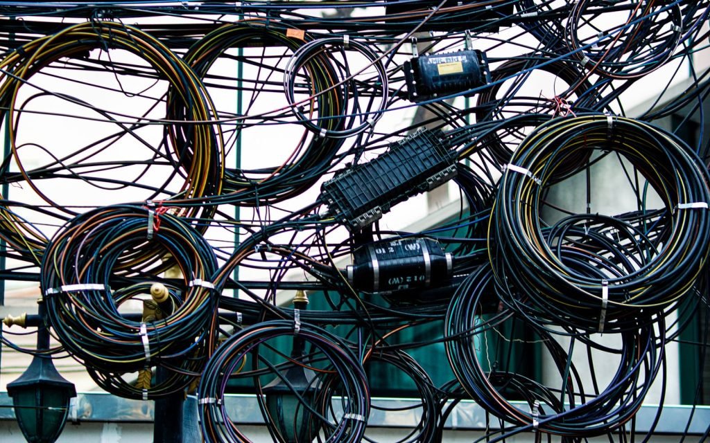A knot of tangled cables, all going to the same place