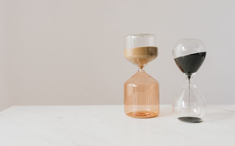 An hourglass running out of sand