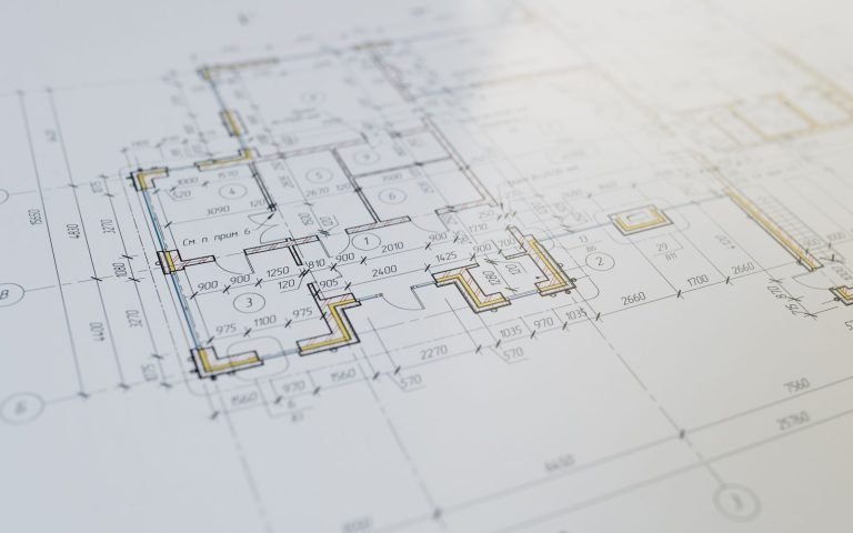 An architect's blueprint with a measured grid of components
