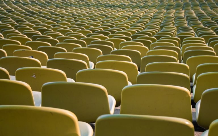 Identical seats in long rows, more than one where one was expected