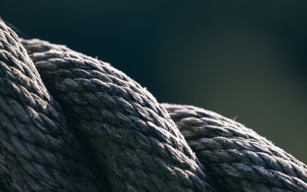 Strands running in parallel, contending where they touch