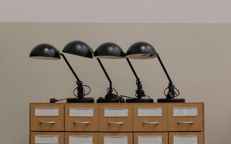 Three cabinets, one of which is still in use