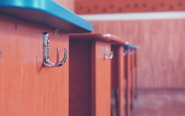 A row of hooks with nothing on them
