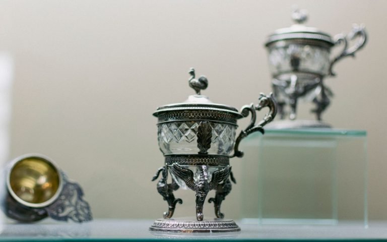 Behind glass: visible, described in detail, and not to be touched