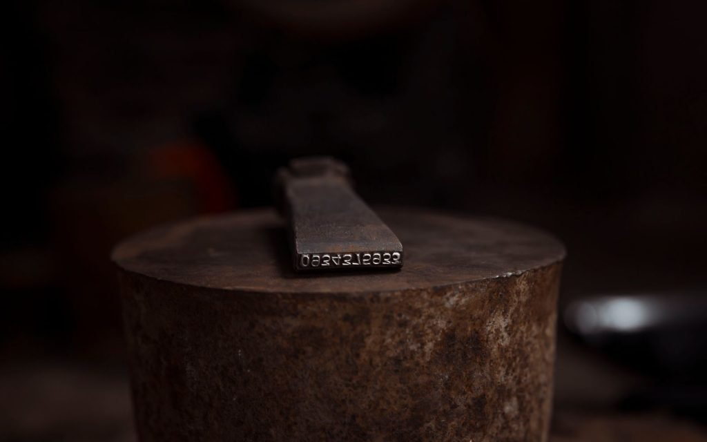 A serial plate: this exact one, not the model