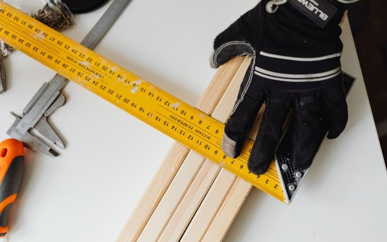 Measuring tools laid on a bench, none of them agreeing exactly
